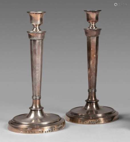 Pair of torches in re silvered metal, shaft with s…