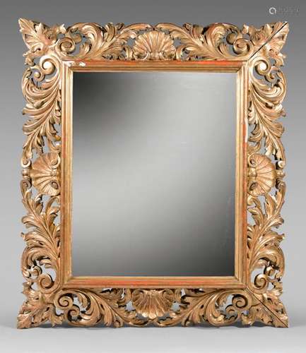 Large bevelled mirror in a gilded wood frame with …