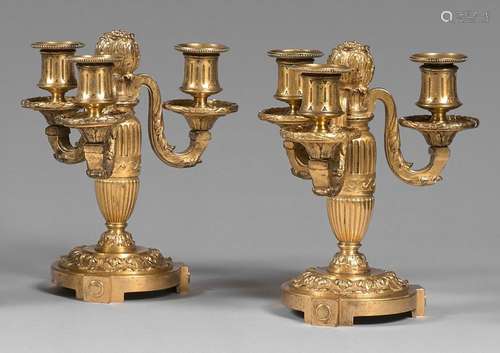 Pair of low gilt bronze candelabra with three leaf…