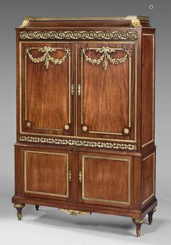 Mahogany cabinet with four doors. Top with a douci…