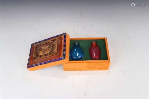 A Pair of Chinese Peking Glass Snuff Bottles