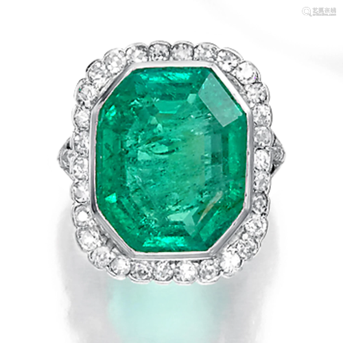 An emerald, diamond, and platinum ri…