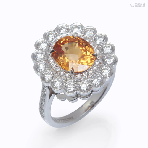 A spessartine garnet, diamond, and pla…