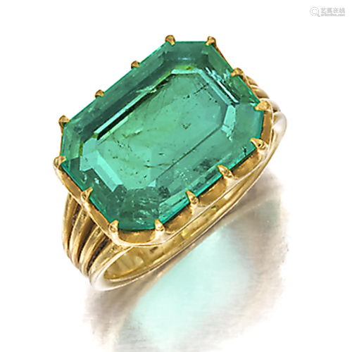 A Colombian emerald and eighteen kar…