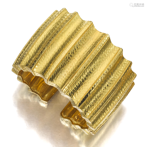 An eighteen karat gold cuff bracelet, David …