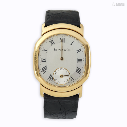 An eighteen karat gold strap wristwatch, Tif…