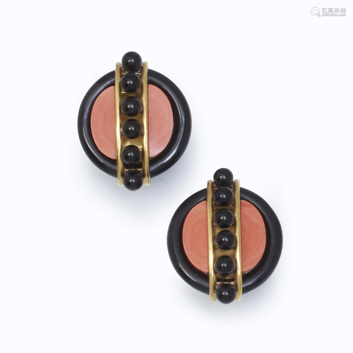 A pair of onyx, coral, and eighteen karat …