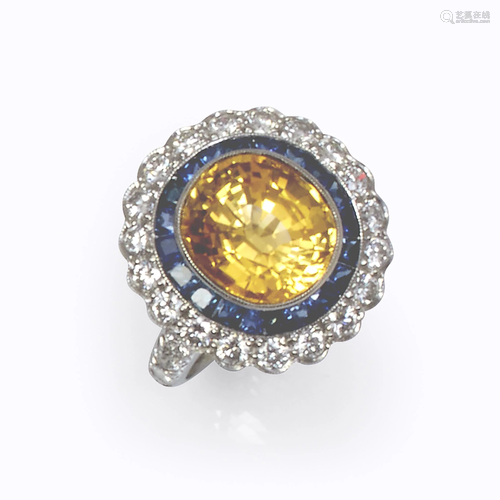 A yellow sapphire, sapphire, diamond, and p…