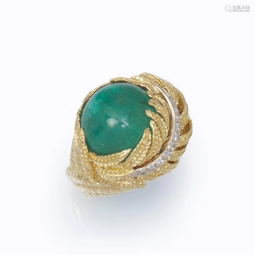 A Colombian emerald, eighteen karat g…