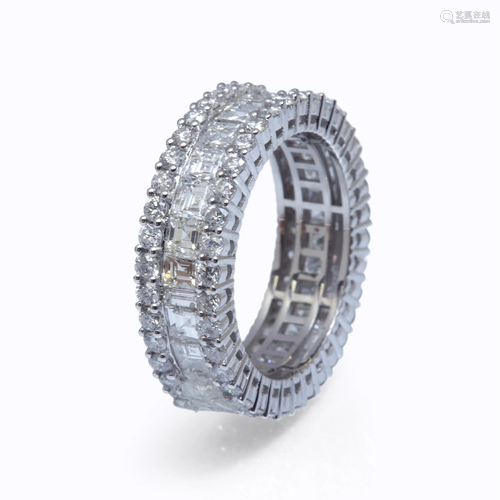 A diamond and eighteen karat white gold…