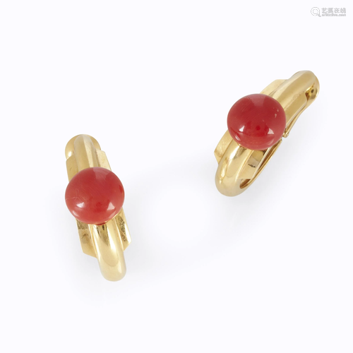 A pair of coral and eighteen karat gold earrin…