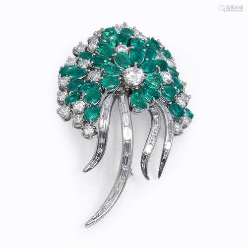 An emerald, diamond, and platinum br…