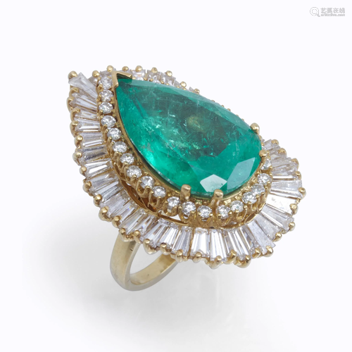 An emerald and diamond pendant ring,