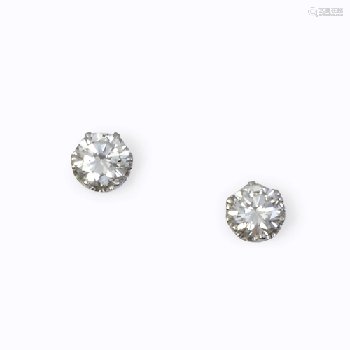 A pair of diamond earrings,