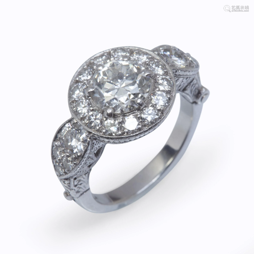 A platinum and diamond ring,