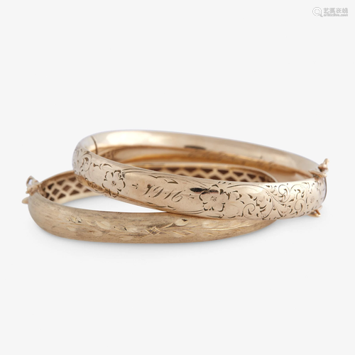 Two gold bangle bracelets,