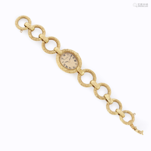 An eighteen karat gold bracelet wristwatch, …