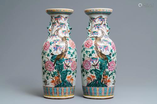 A pair of Chinese famille rose vases with bi…