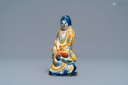 A polychrome Dutch Delft chinoiserie figure of…