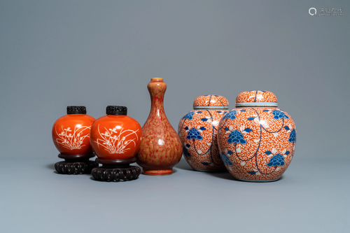 Two pairs of Chinese coral-ground jars and a