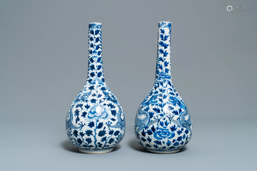 A pair of Chinese blue and white bottle vas…