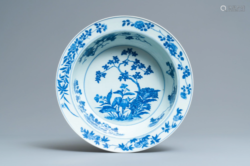A Chinese blue and white basin with floral d…