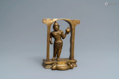 A gilt bronze figure of a temple guardian, N…