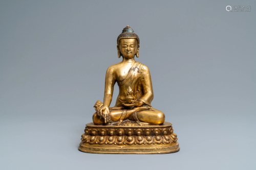 A Tibetan gilt bronze figure of Buddha, early 2…