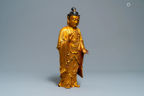 A Chinese gilt and laquered wooden figure …