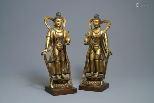 A pair of large Chinese gilt bronze figure…