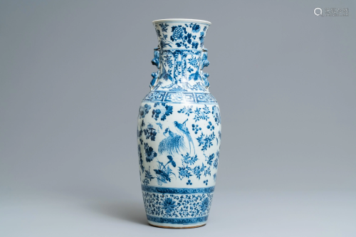 A Chinese blue and white vase with birds am…