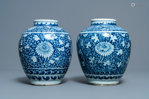 A pair of Chinese blue and white vases wit…