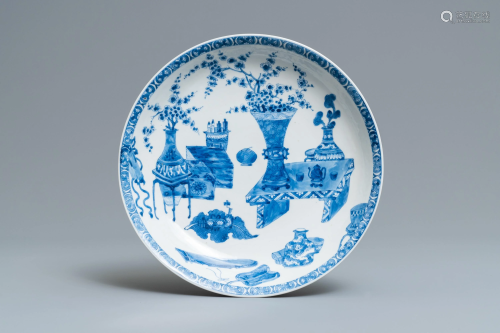 A Chinese blue and white dish with antiquitie…