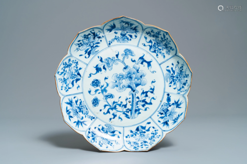 A Chinese blue and white lotus-shaped dish …