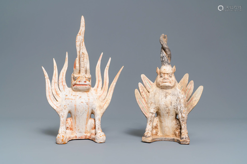 A pair of Chinese painted pottery models of …