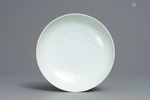 A Chinese celadon saucer dish with undergl…