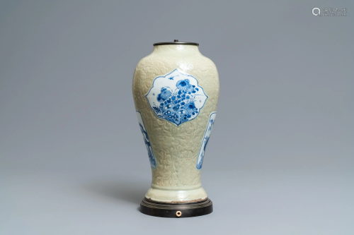 A Chinese blue and white on carved celadon…