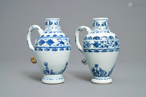 A pair of Chinese blue and white ewers, Tra…