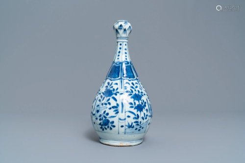 A Chinese blue and white vase with floral de…