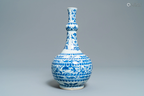 A Chinese blue and white bottle vase with fig…