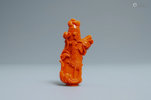 A Chinese carved red coral snuff bottle wit…