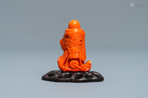 A Chinese carved red coral snuff bottle wit…