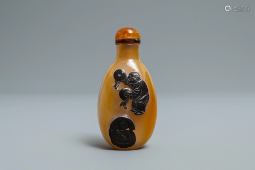 A Chinese carved agate snuff bottle with m…