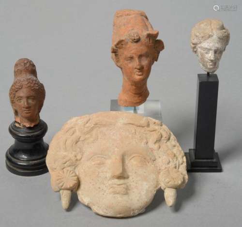 Set of four terracotta objects including: a \