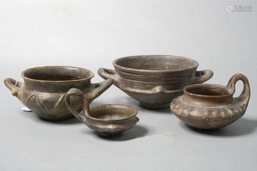 Set of four black glazed terracotta objects includ…