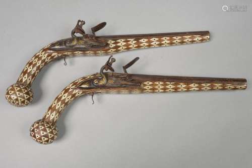 Pair of flintlock pistols with ball pommel, stock …