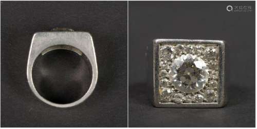 Platinum signet ring set with a central antique cu…