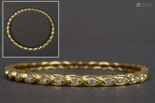 Slave bracelet in 18 karat yellow gold set with br…