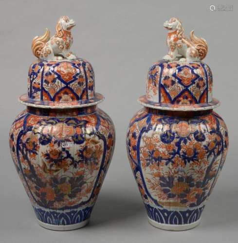 Pair of covered Imari polychrome porcelain vases w…