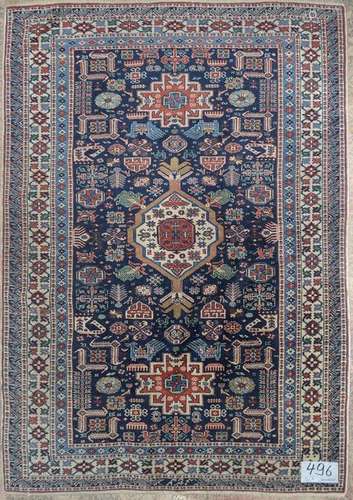 Shirvan wool carpet in dark blue, red and beige to…